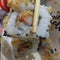 SushiÂ is aÂ Japanese dishÂ of prepared vinegared rice, usually with some sugar and salt, accompanied by a variety of ingredients